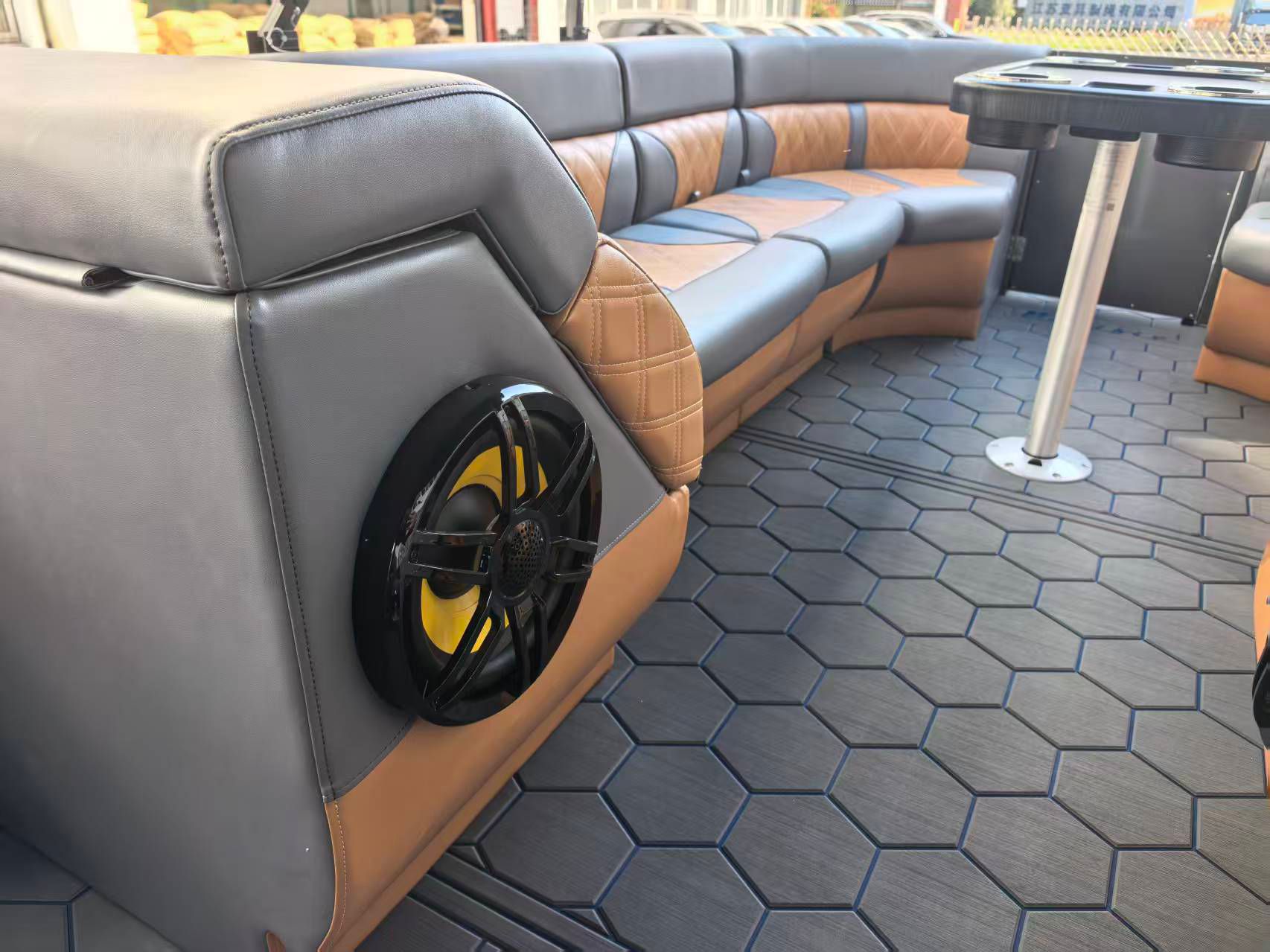 Close-up of the premium lounge upholstery and speaker